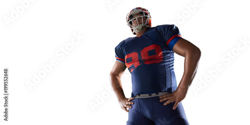 Isolated American football player in white background