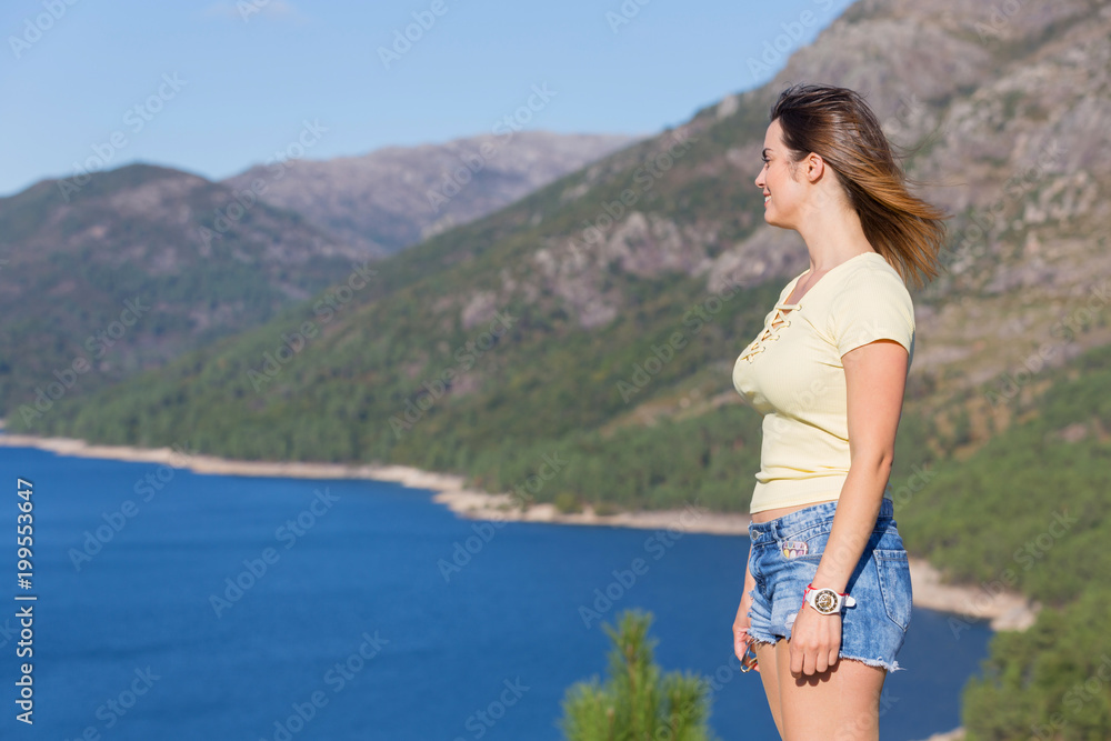 girl enjoying the lake