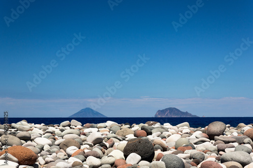 Beautiful sight from the rocky beach of Salina, a little sicilian island