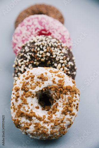 close up donuts on blue background