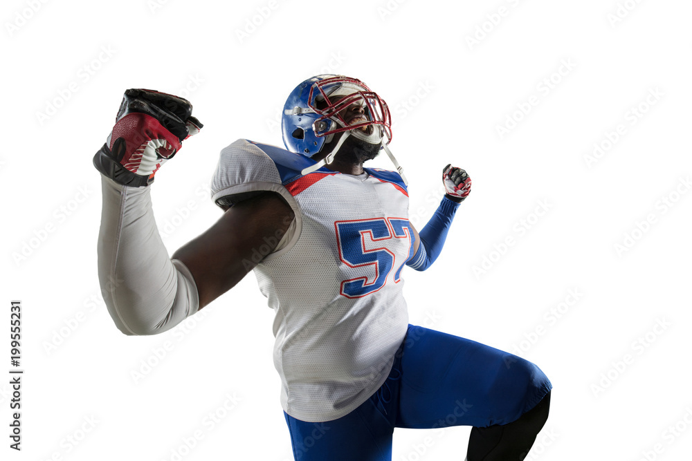 Isolated Black American football player rejoices in victory in white background