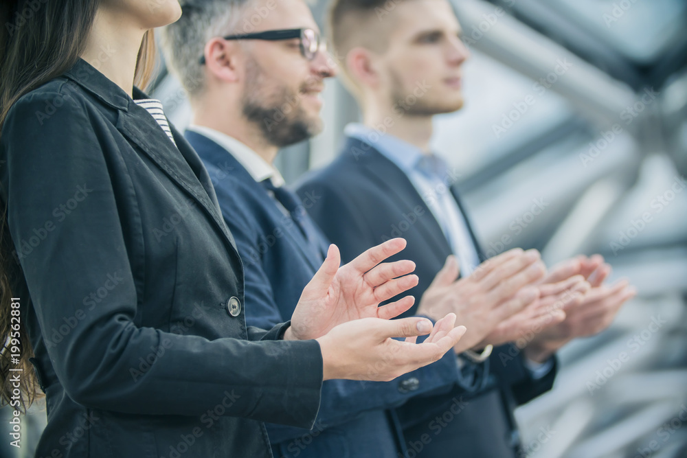 a group of businessmen applause a group of businessmen applause