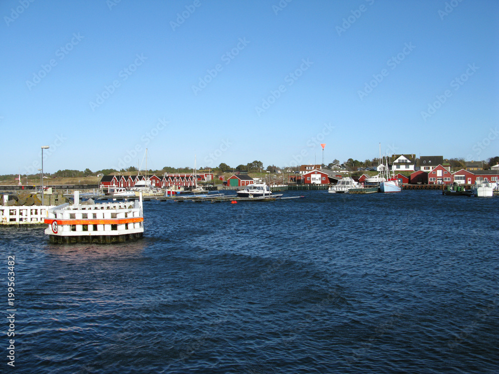 Laesoe / Denmark: View from the port entrance to the small fishing port in Vesteroe Havn