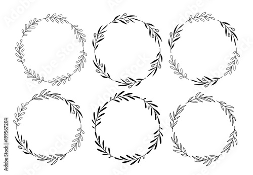 Set of hand drawn vector round floral wreaths