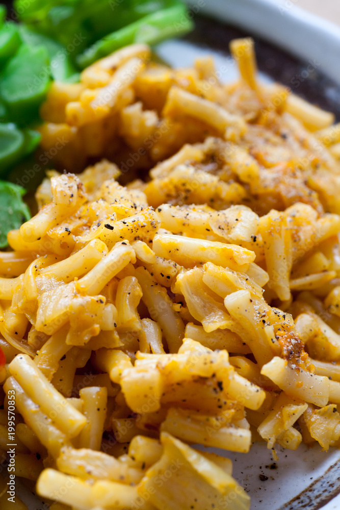Macaroni and cheese on the plate Macaroni and cheese on the plate
