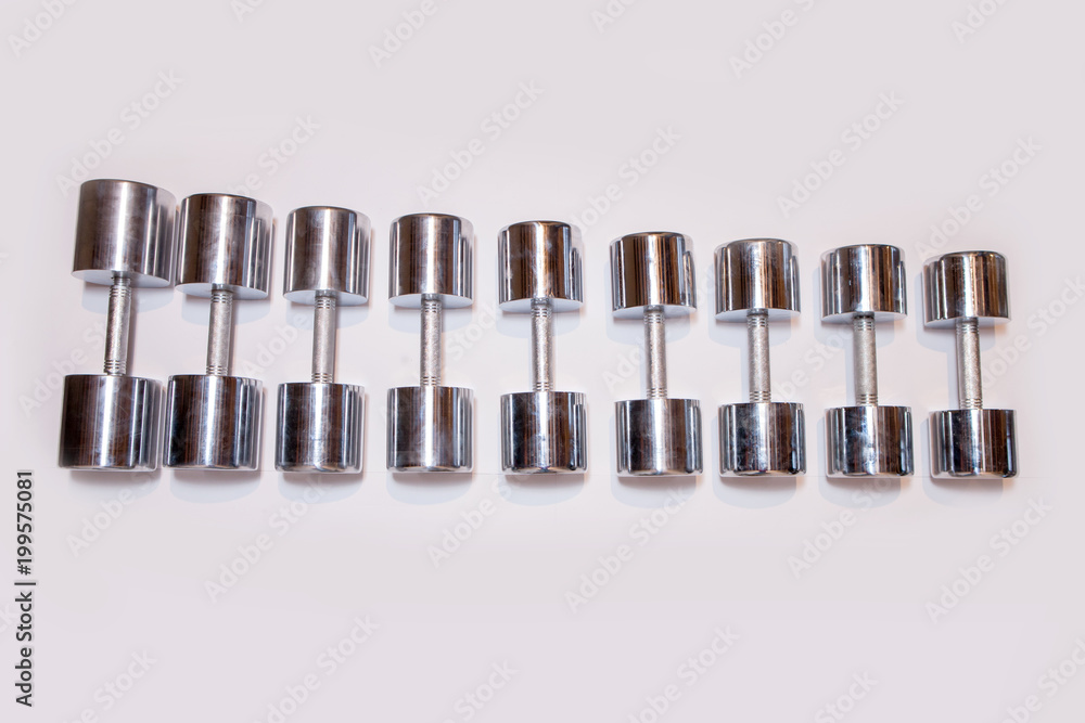 dumbbell weights isolated on a white background dumbbell weights isolated on a white background