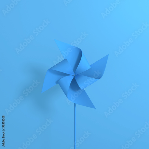 Paper windmill isolated on blue background. minimal style
