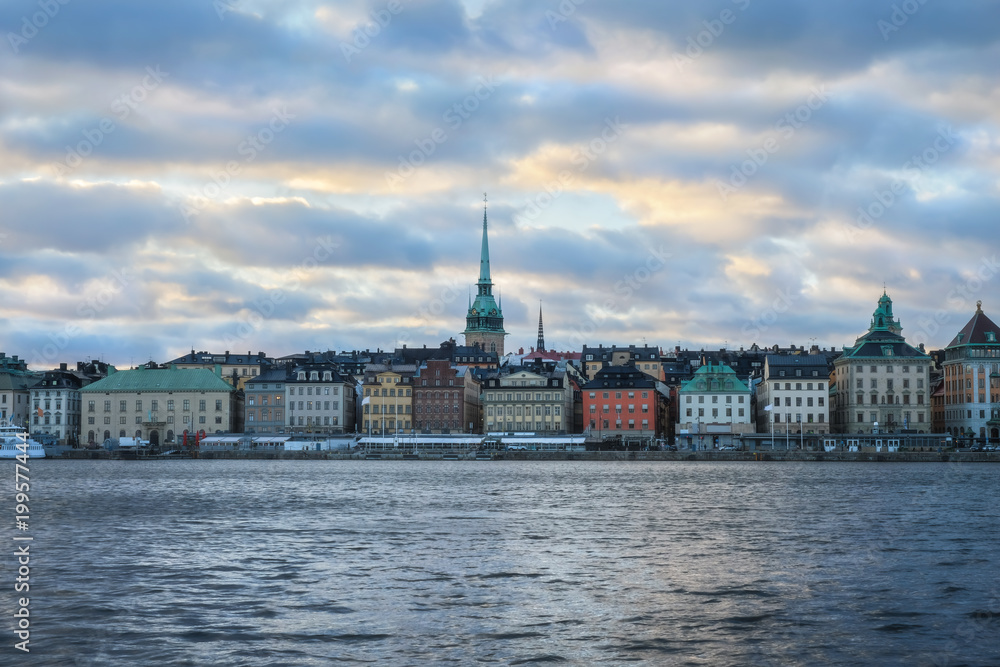 Cityscape of Gamla Stan in Stockholm, Sweden, at sunset.