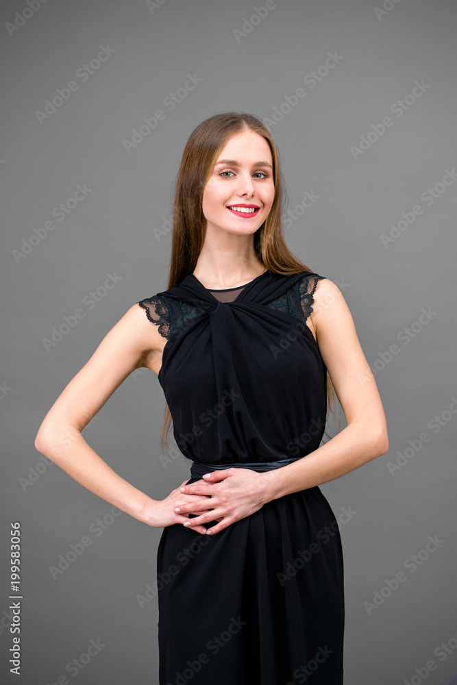 Beautiful brunette woman in black dress Beautiful brunette woman in black dress