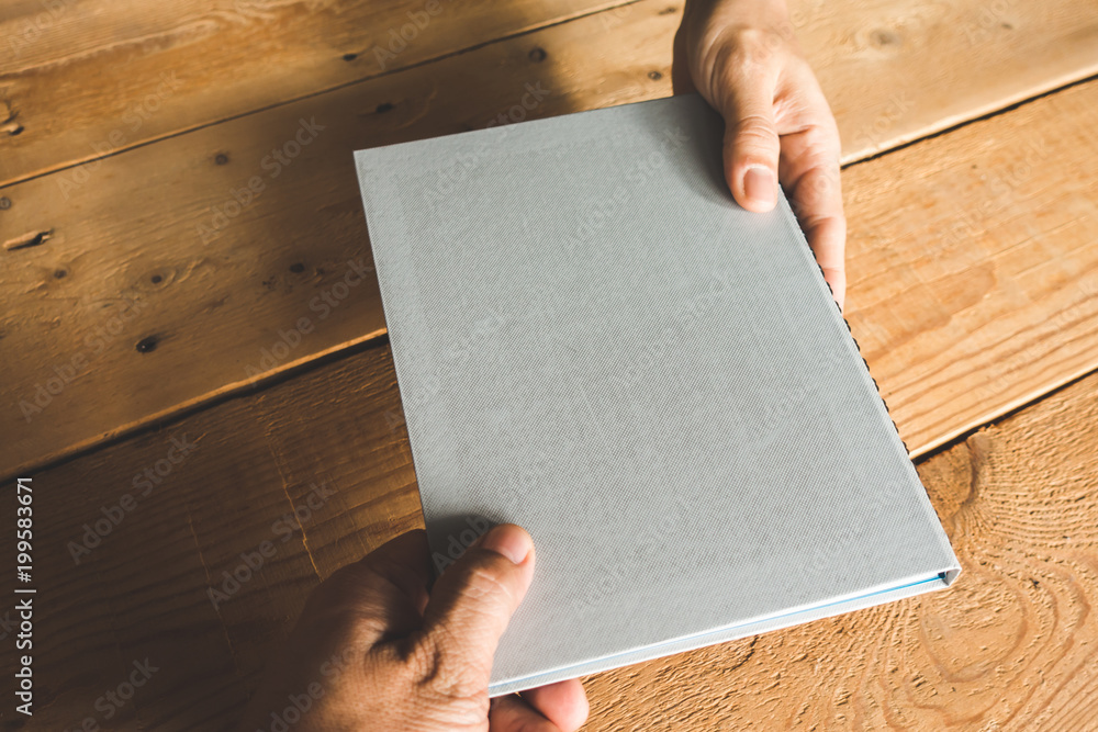Closeup notebook on wooden table. Closeup notebook on wooden table.
