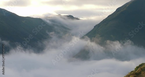 A cloud inversion over Hartsop from Hartsop above How with the summits of Middle Dodd and Red Screes on the Right. English Lake District, England UK. photo