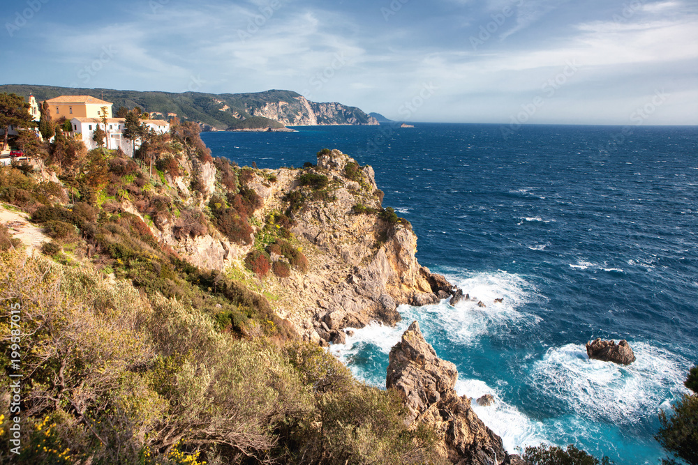 Panoramic view of the bay with the monastery and the sea in Paleokastritsa, Corfu, Greece