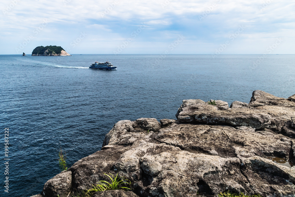 Munseom island seen from a cliff in Seogwipo, Jeju Island, Korea Munseom island seen from a cliff in Seogwipo, Jeju Island, Korea
