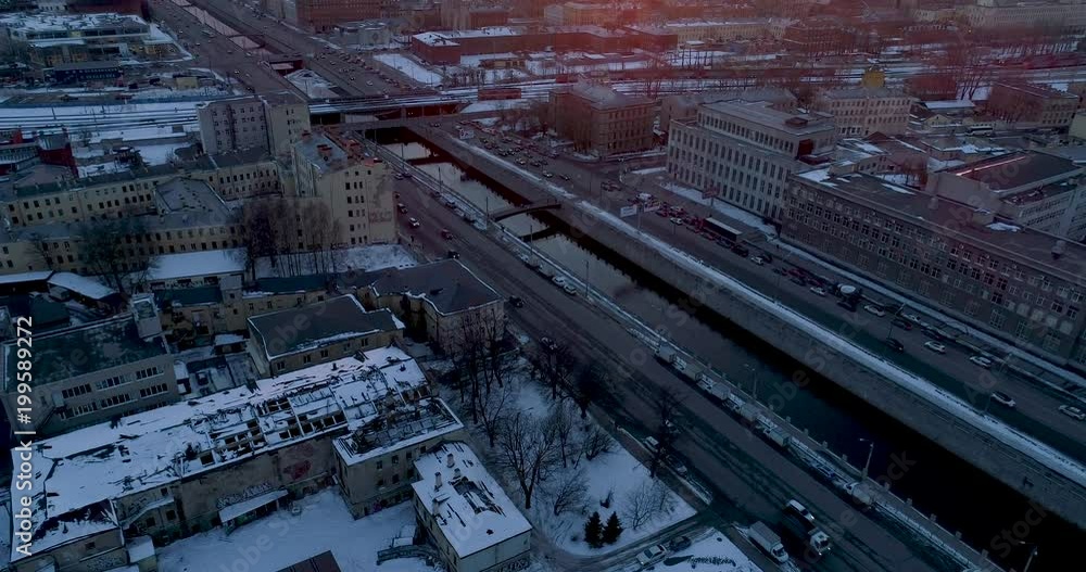 Winter's sunset view on the embankment from the height of the bird's flight. Aerial view. Cityscape Winter's sunset view on the embankment from the height of the bird's flight. Aerial view. Cityscape