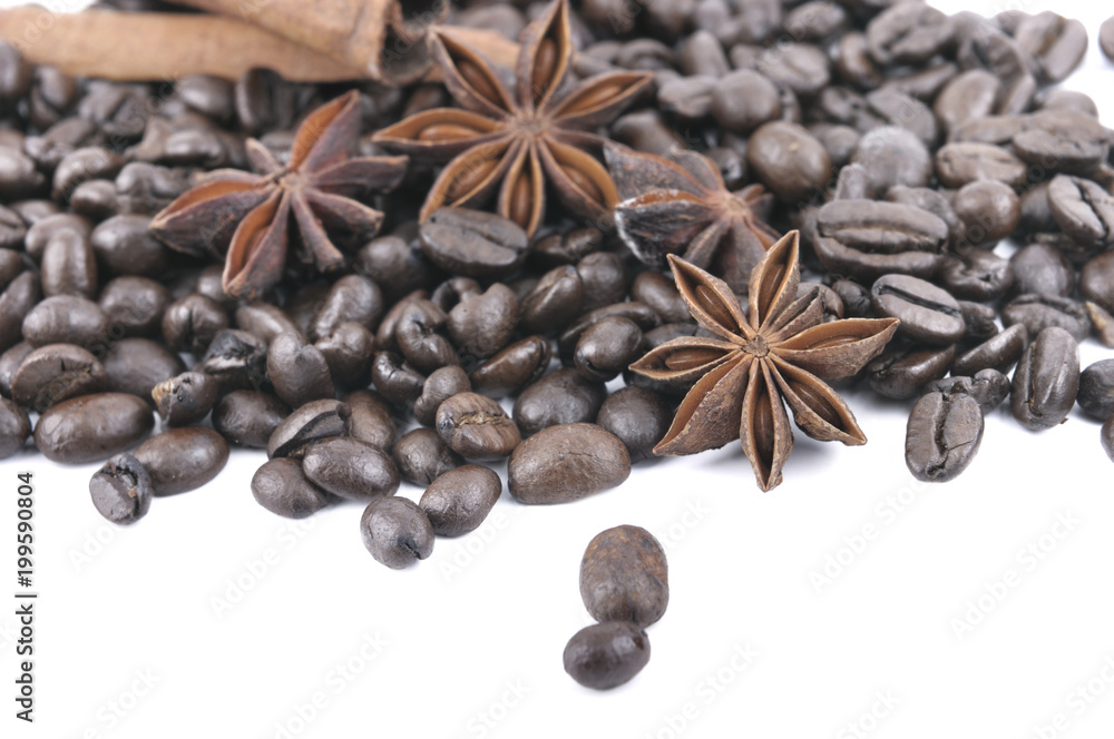 anise and cinnamon in coffee beans heap on white background anise and cinnamon in coffee beans heap on white background