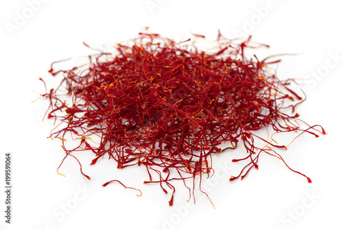 dried saffron, obtained from crocus flower, isolated on white, close up 