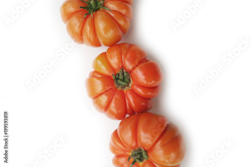 Ribbed heirloom tomato Costoluto isolated on white background