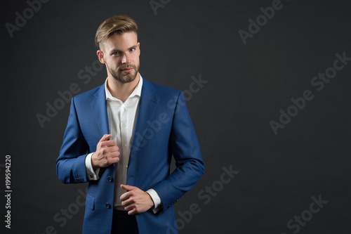 Man in blue suit jacket and shirt. Businessman with bearded face and stylish hair. Manager in formal outfit. Fashion, style and dress code. Business, entrepreneurship and career concept, copy space