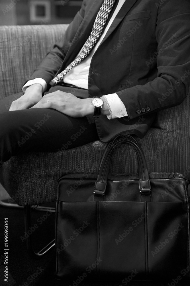 Young stylish businessman in suit