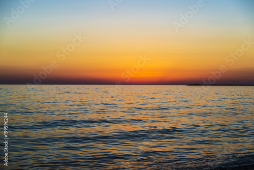 Sunset over the Mediterranean sea in summer in Sicily  Italy