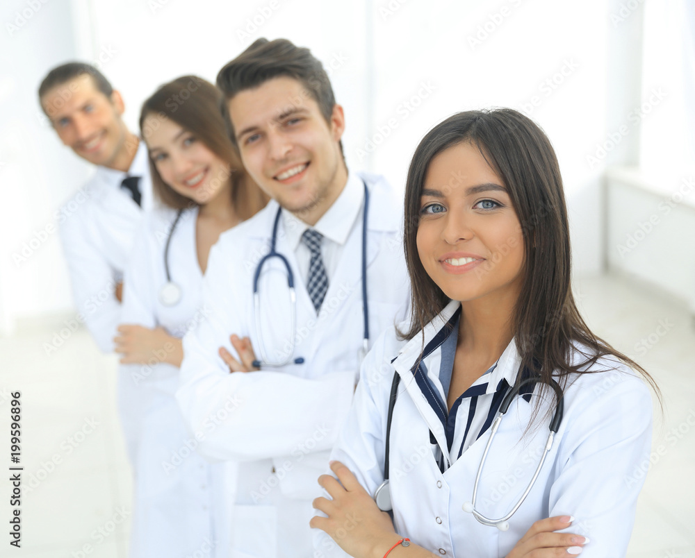 female doctor with group of happy successful colleagues female doctor with group of happy successful colleagues