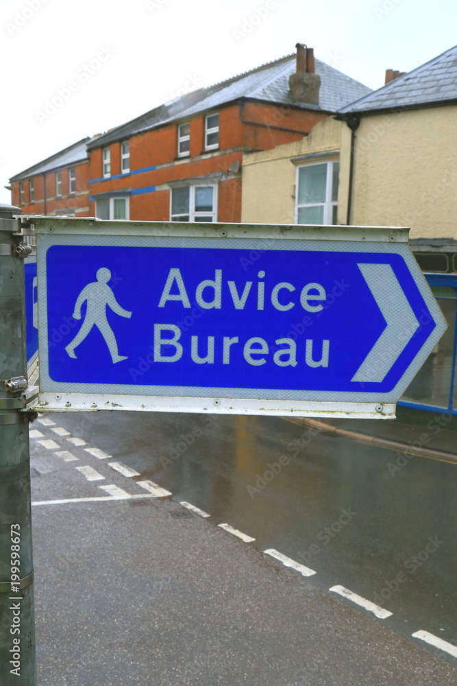 Fototapeta premium Advice Bureau sign on the street in Axminster, Devon