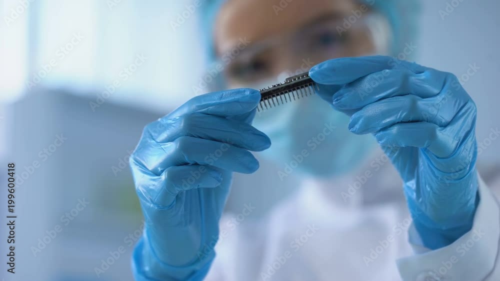 Female engineer developing computer microchip, information technology industry Female engineer developing computer microchip, information technology industry