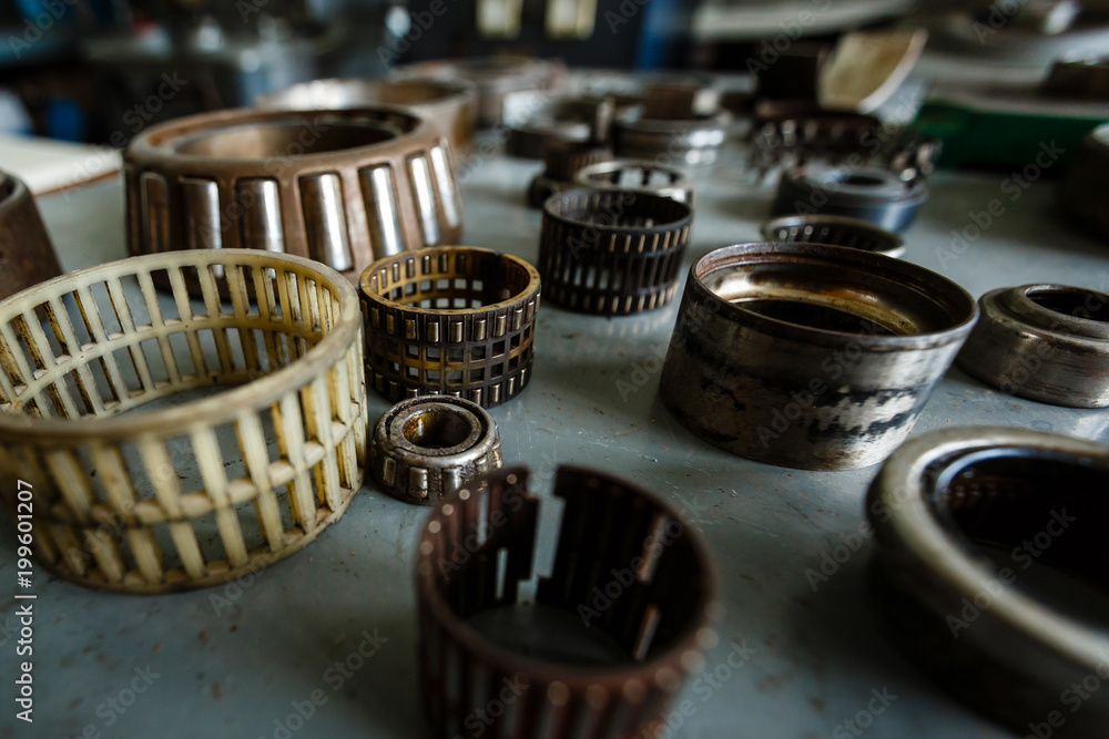 Old rusty different metallic bearing bolts and nut old it used Old rusty different metallic bearing bolts and nut old it used