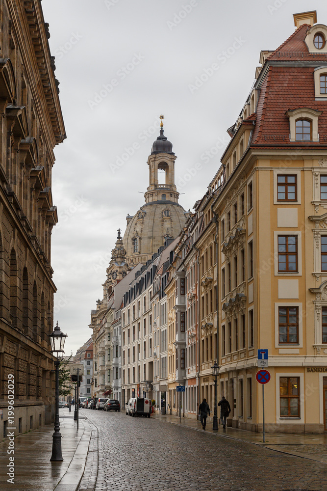 Street view in city of Dresden with Church of our Lady in the Background