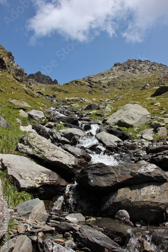 Little waterfall with brook in the Italian Alps (Alpi Orobie, Pizzo Coca)