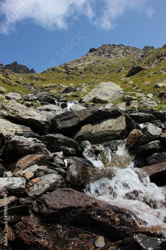 Little waterfall with brook in the Italian Alps (Alpi Orobie, Pizzo Coca)
