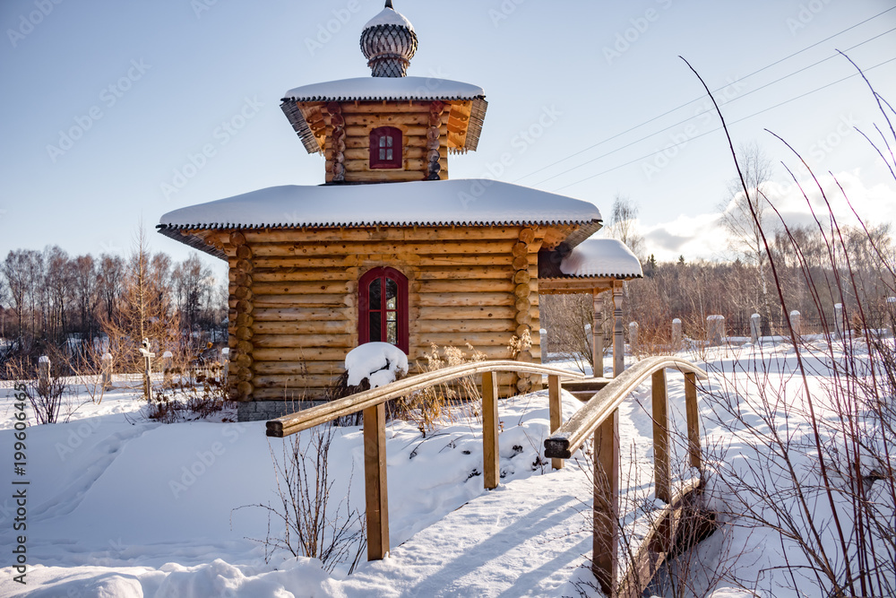 Wooden chapel in the village of Kutepovo in winter, Russia Wooden chapel in the village of Kutepovo in winter, Russia