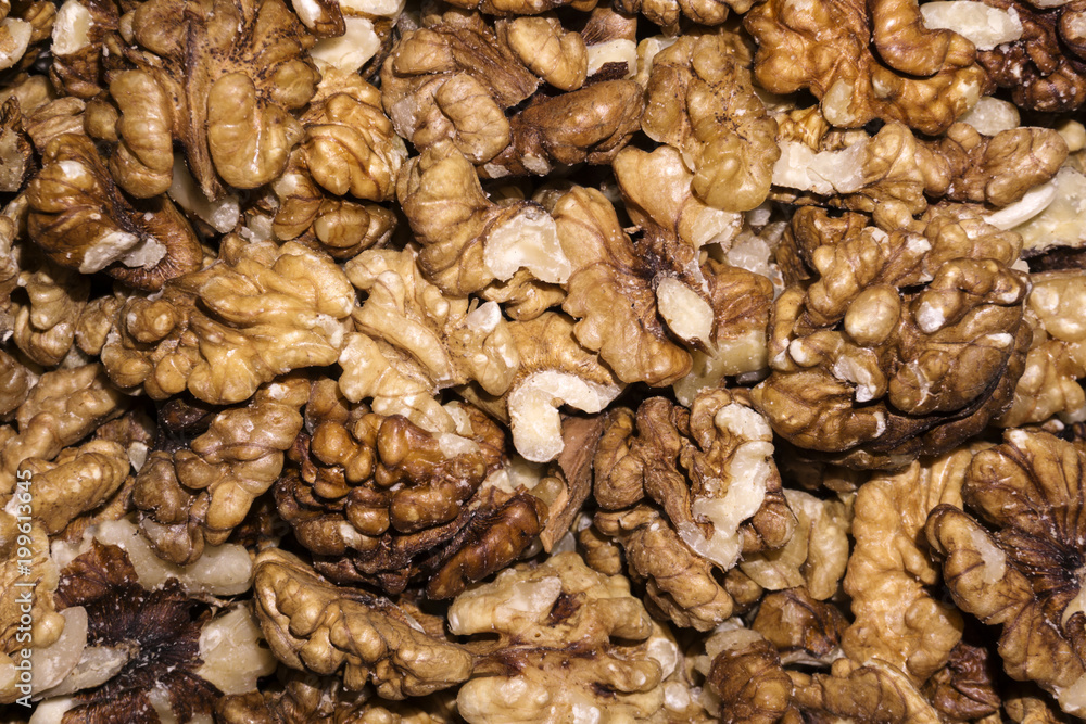 background - peeled ripe walnut kernels closeup.. background - peeled ripe walnut kernels closeup..
