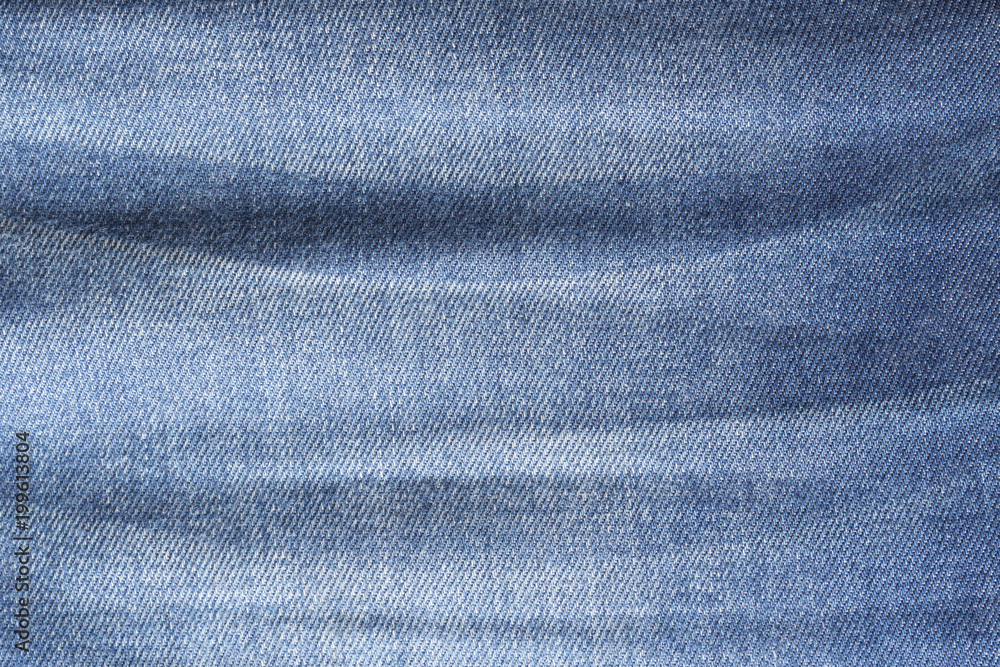 Naklejka premium Blue jeans textile texture for background