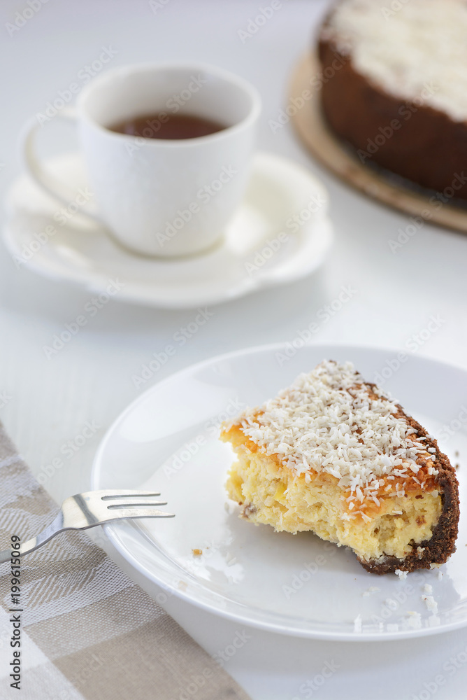 coconut cheesecake with a cup of tea coconut cheesecake with a cup of tea
