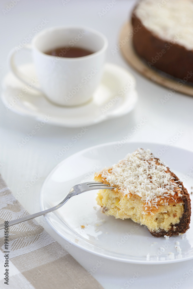 coconut cheesecake with a cup of tea coconut cheesecake with a cup of tea