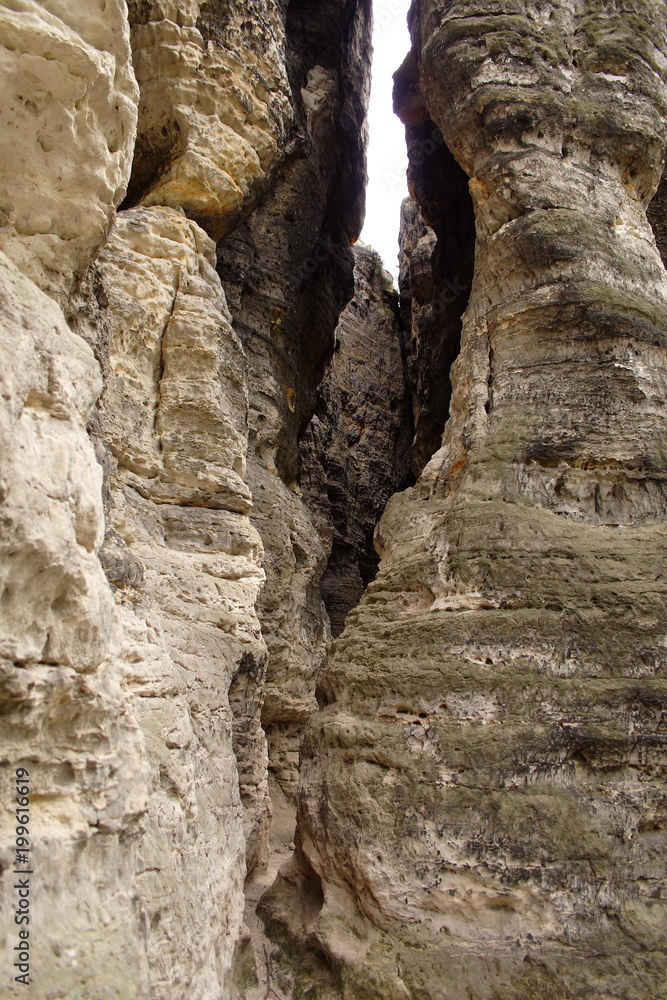 Opening between rock mountain walls.
