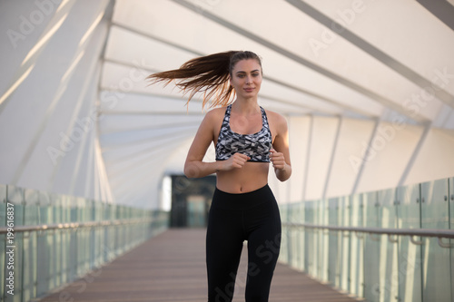 Active woman runner  outdoors running  sport and healthy lifestyle concept.