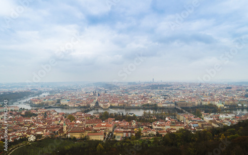 Panoramic view of Charles Bridge and other bridges over Vltava river and Old city from Petrin hill Observation Tower. Prague, Czech Republic, autumn cityscape