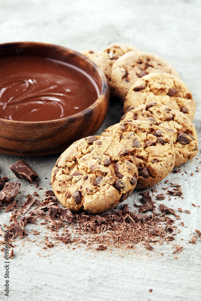 Fototapeta premium Chocolate cookies on grey table. Chocolate chip cookies shot