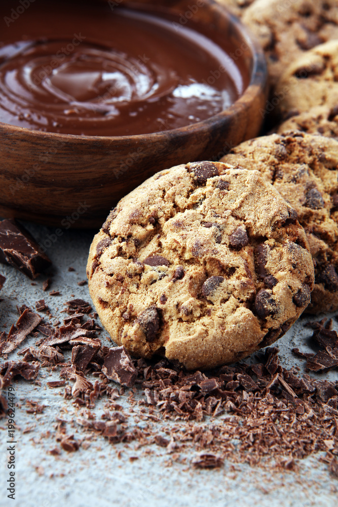 Chocolate cookies on grey table. Chocolate chip cookies shot Chocolate cookies on grey table. Chocolate chip cookies shot