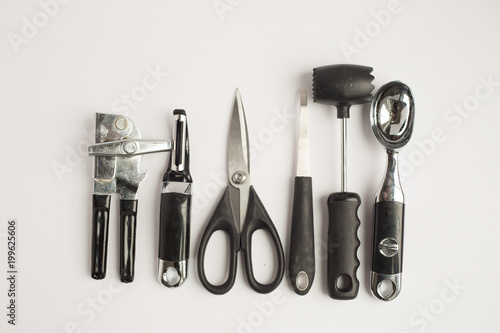 Black and steel kitchen gadgets shot overhead