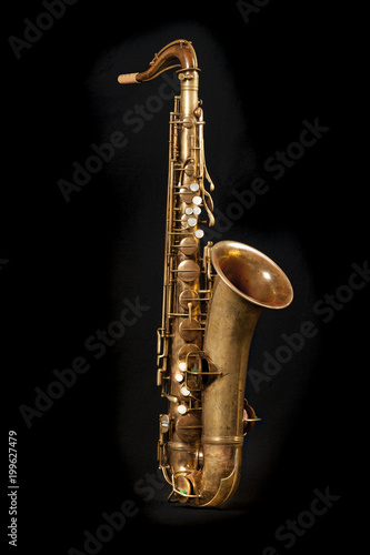 Tenor sax on black background photo