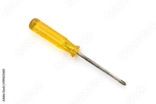 old dirty screwdriver with yellow plastic handle, isolated on white