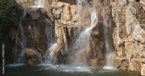 Waterfall with rock and stone