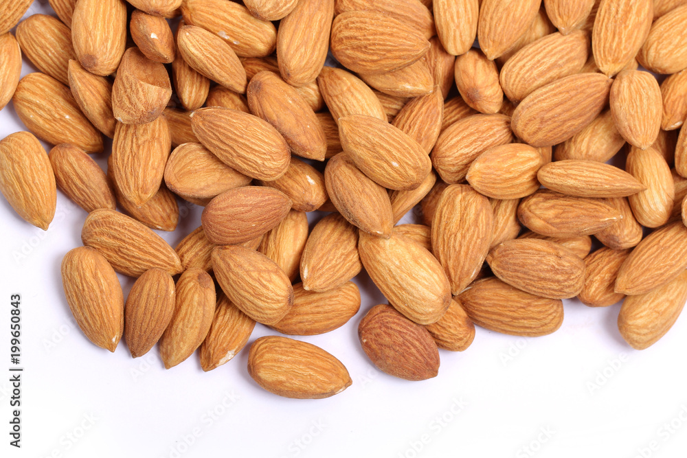 Almonds isolated. Group of almond nuts isolated on white background. Full depth of field