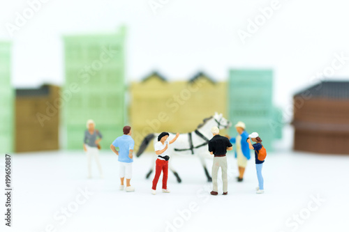 Miniature people : Pet market for animal lovers. Image use for business concept.