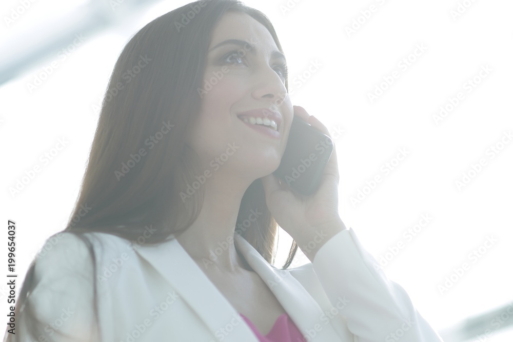 female lawyer talking to a client on the smartphone female lawyer talking to a client on the smartphone