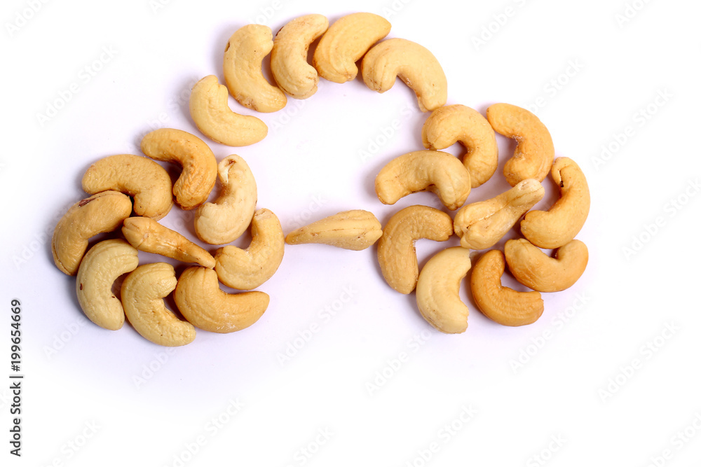 Unshelled roasted and salted cashew nuts isolated on white background Unshelled roasted and salted cashew nuts isolated on white background