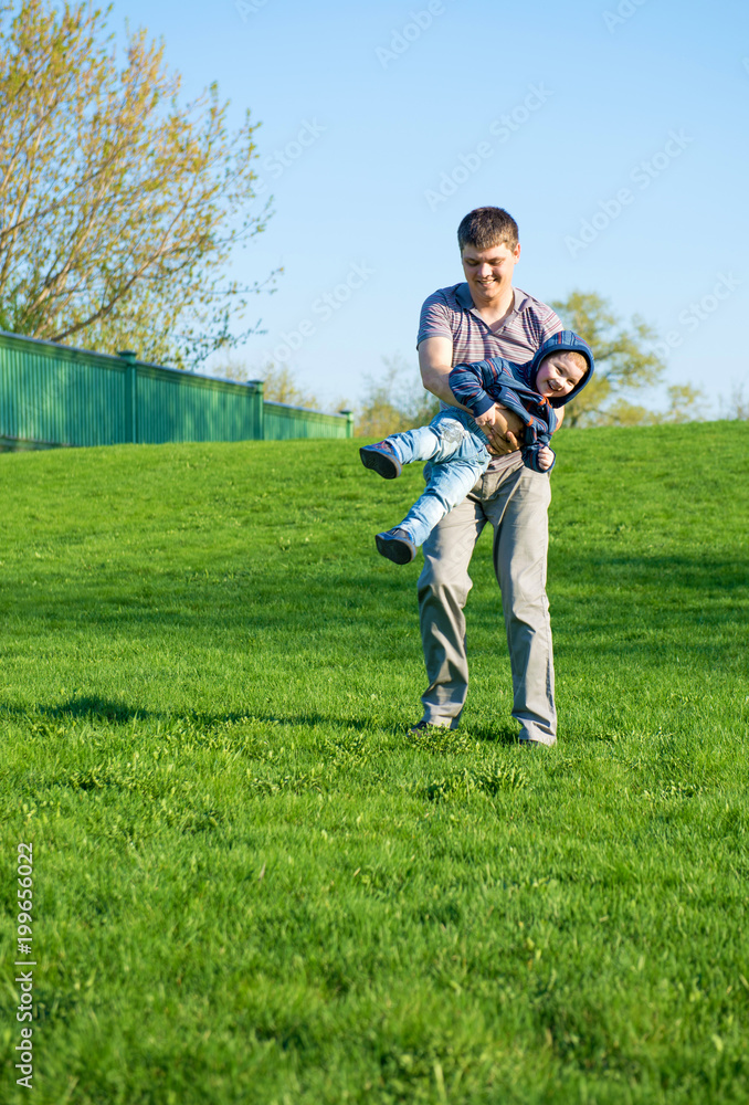 Fototapeta premium Father and his small son play